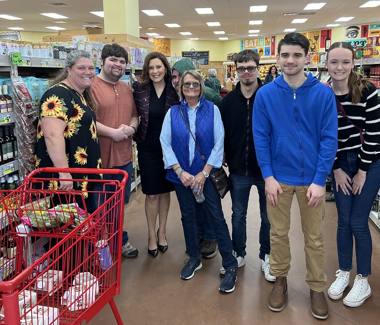 Educators and students on outing enjoy ‘brush with fame’ seeing governor at Trader Joe’s