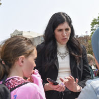 Students visit their former teacher, State Representative Jaime Churches, outside the Michigan Capitol.