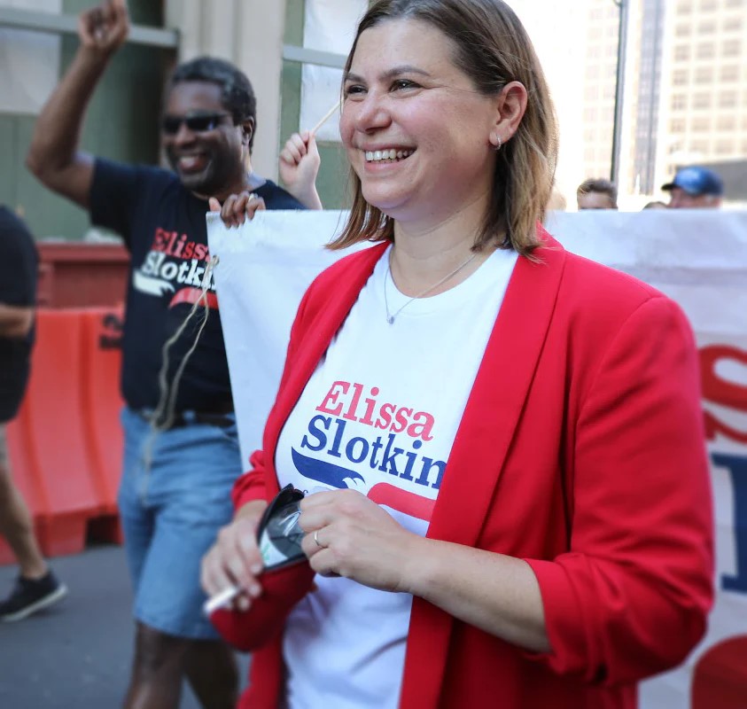 Elissa Slotkin smiling while on the campaign trail.