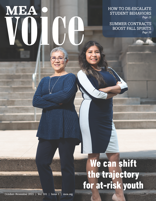 A photo of the cover of the VOICE Magazine featuring two smiling educators