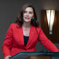 A picture of Governor Gretchen Whitmer giving a speech