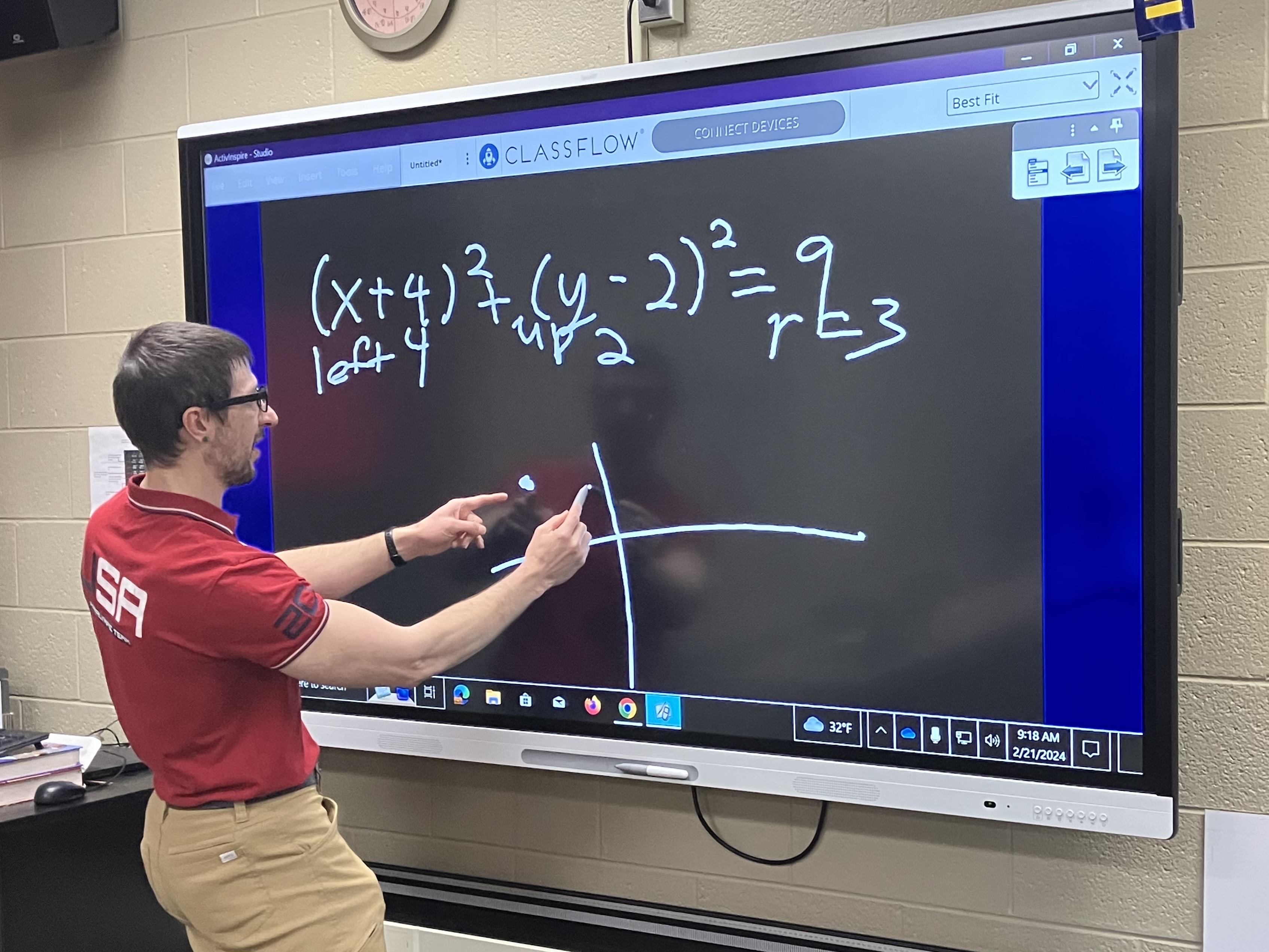 John Kusku uses a special smartboard to teach math at the Oakland Technical Campus Southwest. 