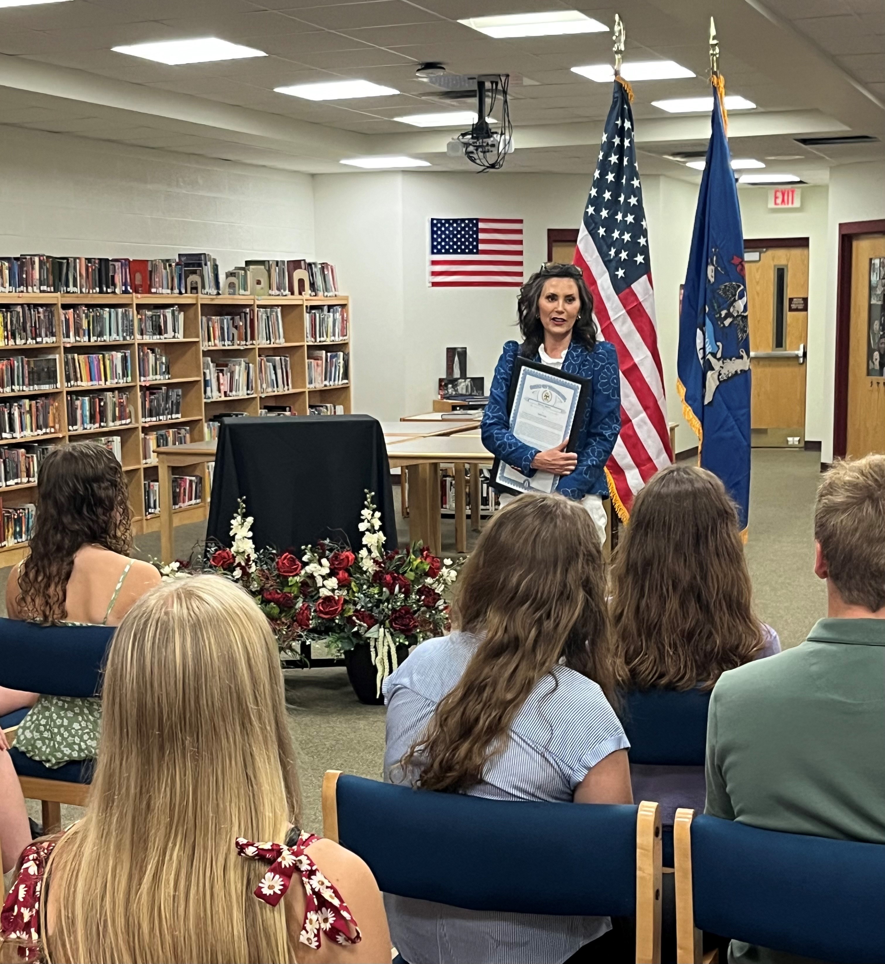 A photo of Governor Gretchen Whitmer speaking to a classroom