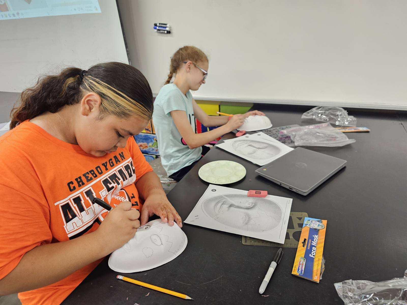 A photo of students at a desk