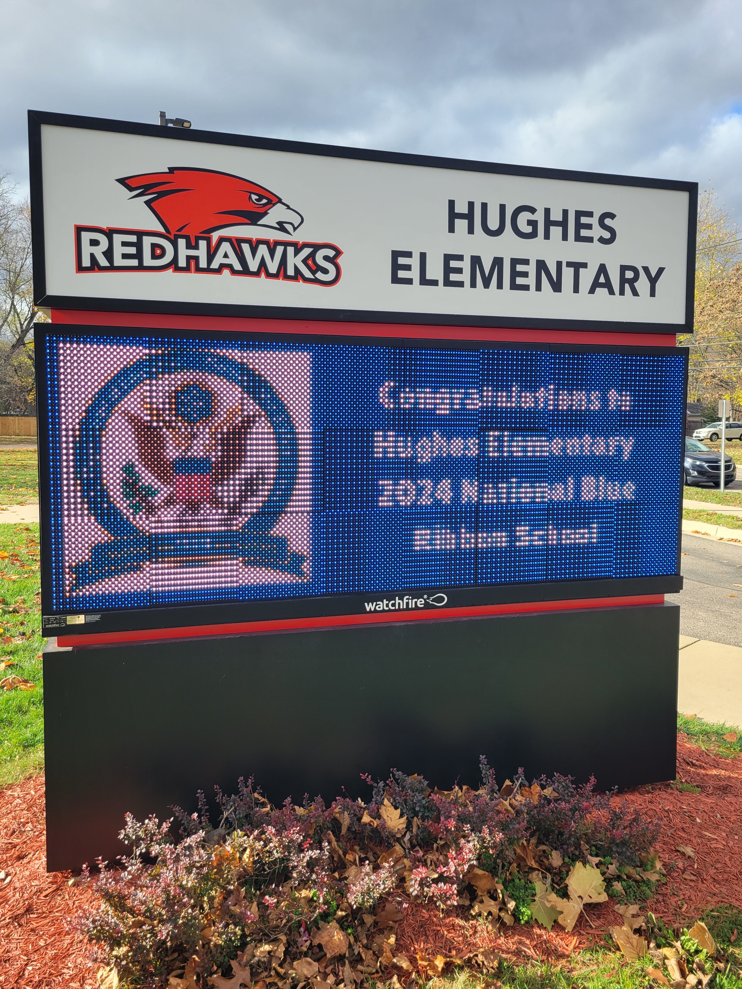 a photo of the Hughes Elementary sign